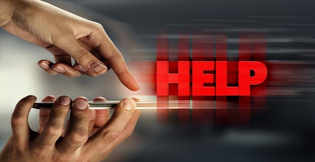 Stylized image of person touching a mobile device with the word "HELP".